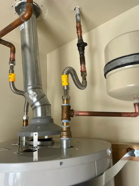Water heater installation and plumbing repair in Macochee Castle